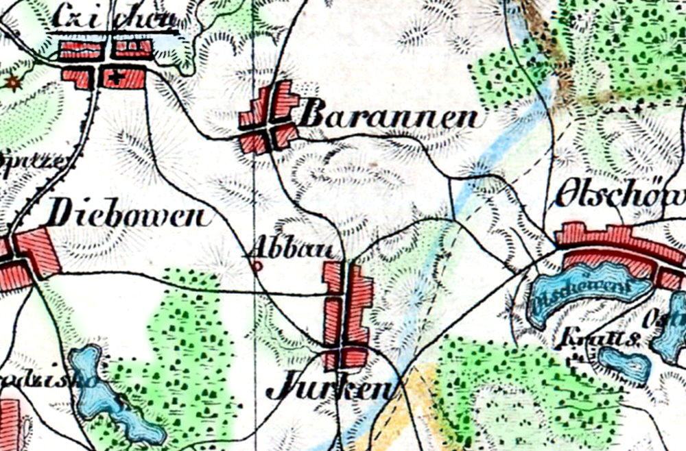 Kolorowa, stara mapa pokazująca wsie i miejscowości w okolicy. W centrum widoczna jest wieś o nazwie „Jurken”, a powyżej niej znajdują się miejscowości „Barannen” i „Diebowen”. Na mapie zaznaczono także lasy na zielono, drogi, strumienie oraz jeziora w kolorze niebieskim. Budynki oznaczono czerwonymi prostokątami.