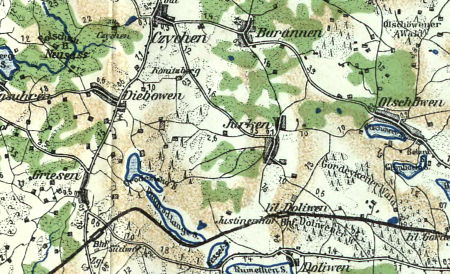 Kolorowa mapa topograficzna z nazwami miejscowości w języku niemieckim i polskim. Na środku mapy znajduje się wieś Jurken (Jurki), a wokół niej inne miejscowości, m.in. Barannen (Barany), Kl. Dollwen i Justinenhof. Widać rzeki, drogi, lasy (zielone obszary), pagórki (brązowe linie konturowe) oraz pola.